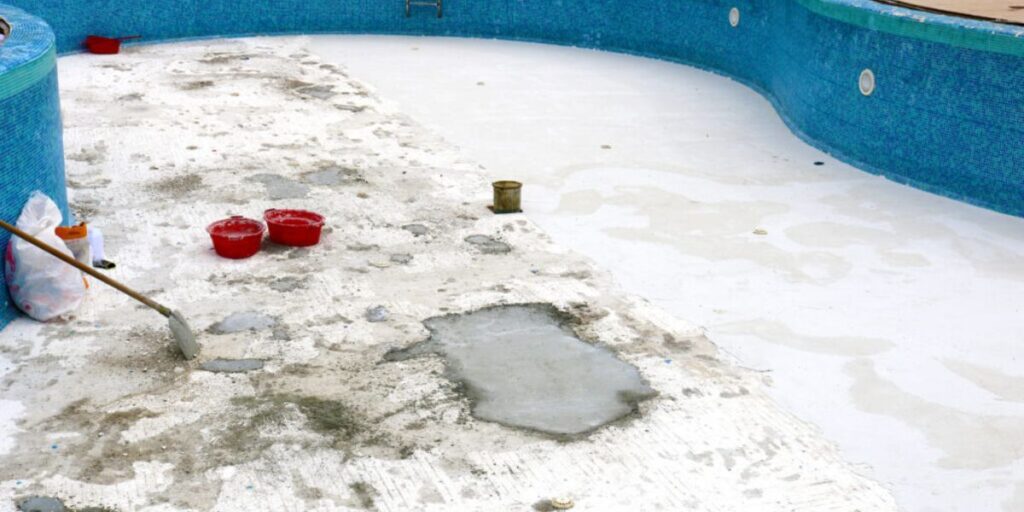 Fiberglass pool installation in progress with soil preparation for a residential backyard | How Soil Types Affect Fiberglass Pool Installation